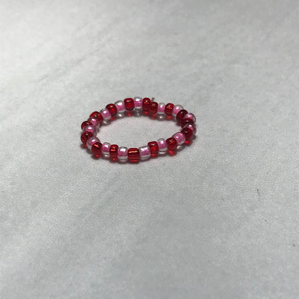red and pink seed bead ring